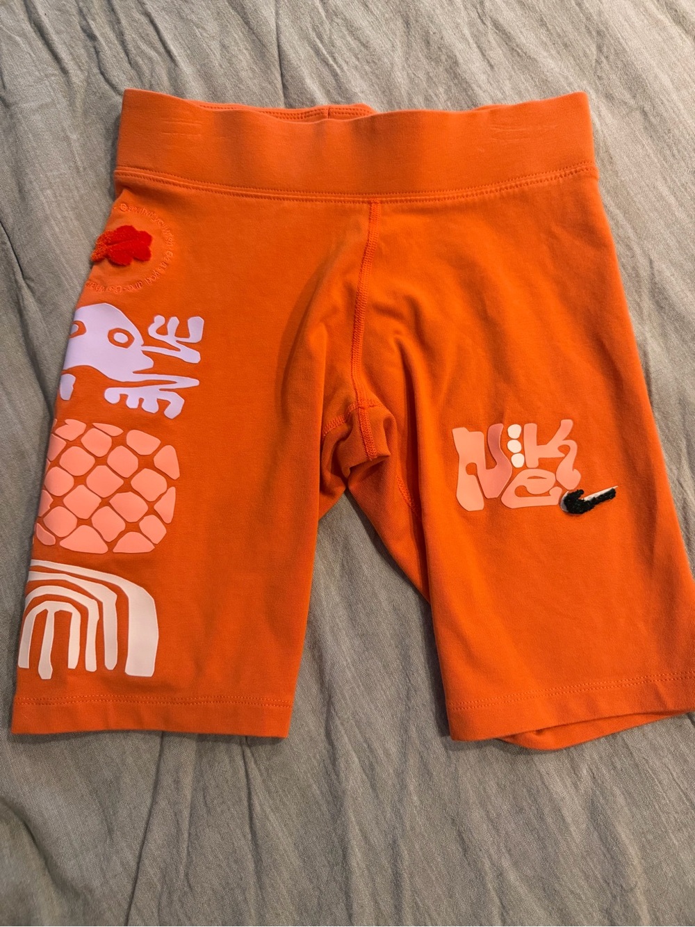 Nike Orange Graphic Biker Shorts with Logo